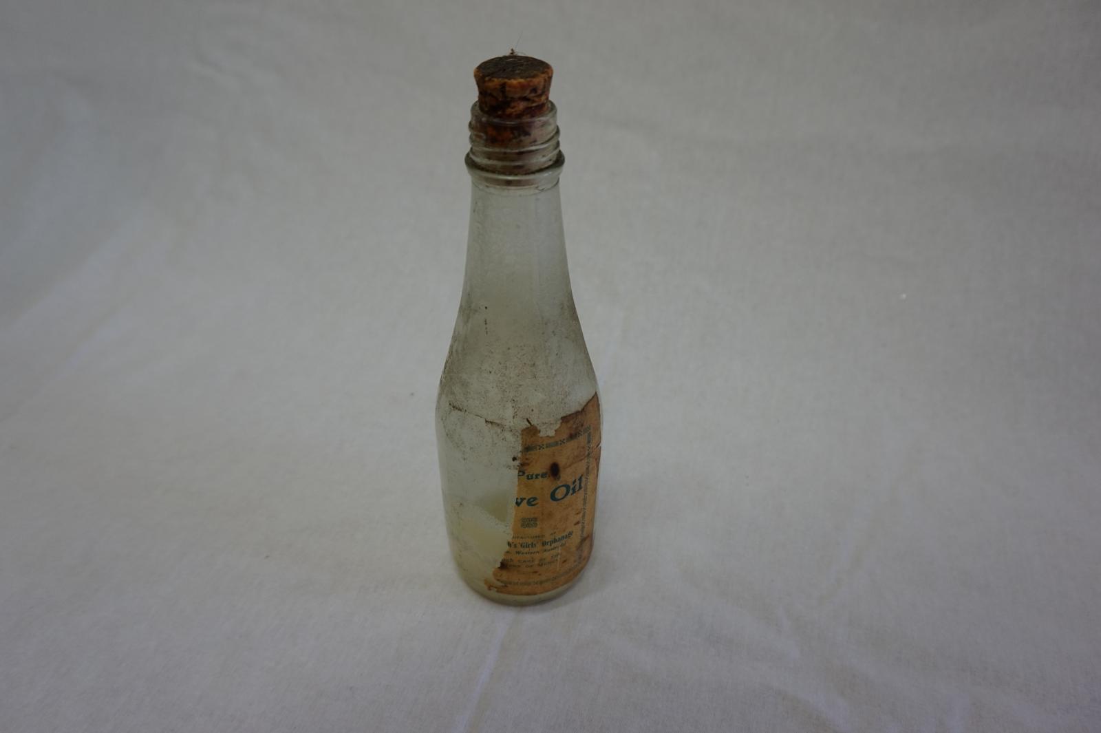 Clear Glass Bottle with Cork - St Joseph's Orphange Label - Contains Oil