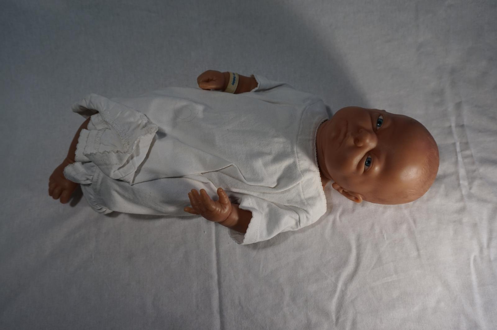 1 Plastic Doll