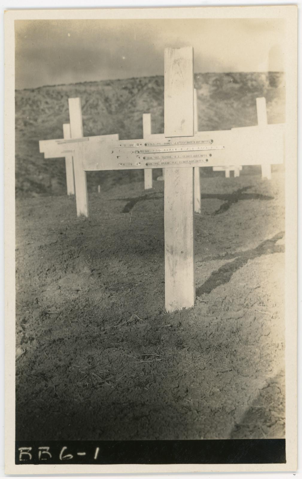 B&W photographic postcard of Pte James DENNEY's gravesite, (foreground).