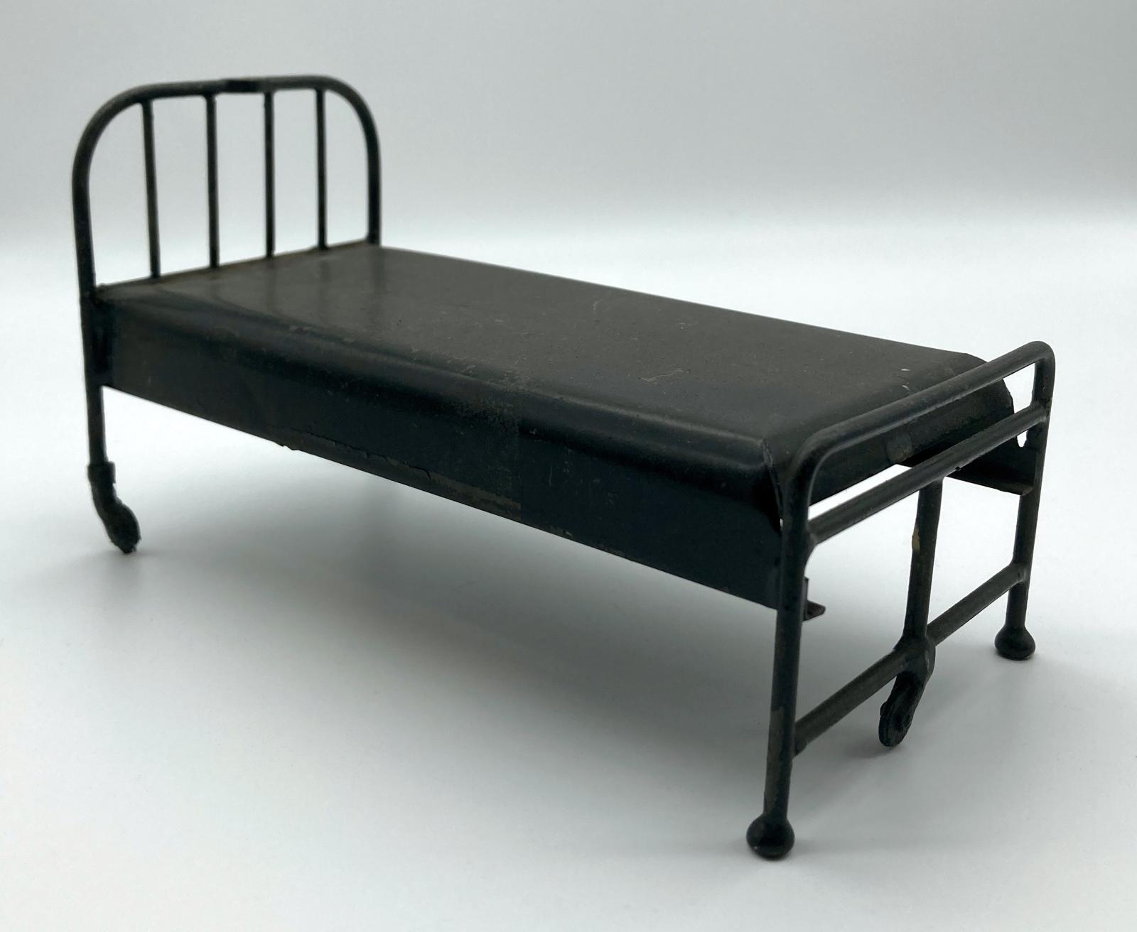 Miniature hospital bed made by convalescent soldier - side view