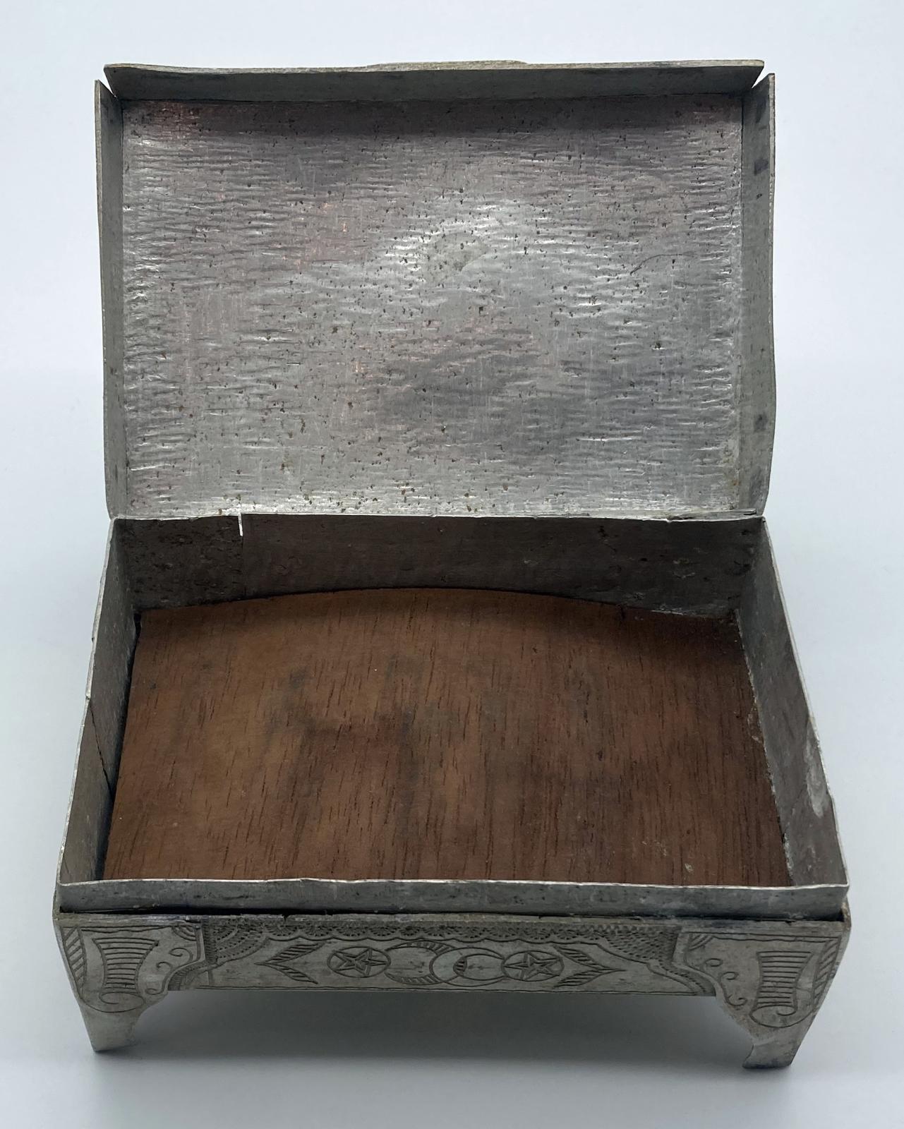 Front view of open Ottoman POW trench art cigarette box