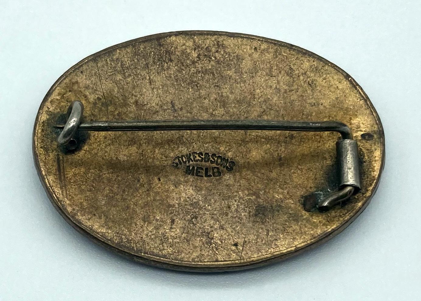 Reverse of Red Cross Volunteer Motor Corps enamel badge