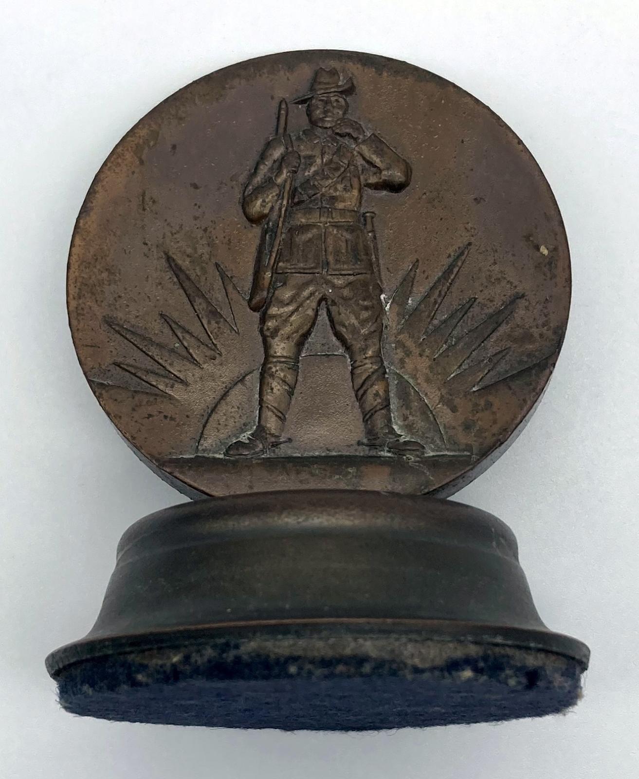 Victorian Golf Association War Medallion showing soldier and rising sun