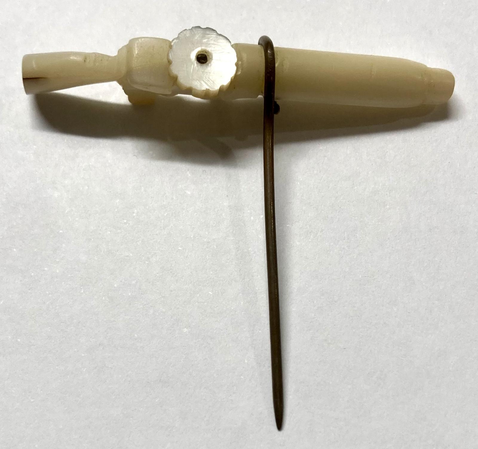 WWI era Mother of Pearl Lewis Gun pin - view from above