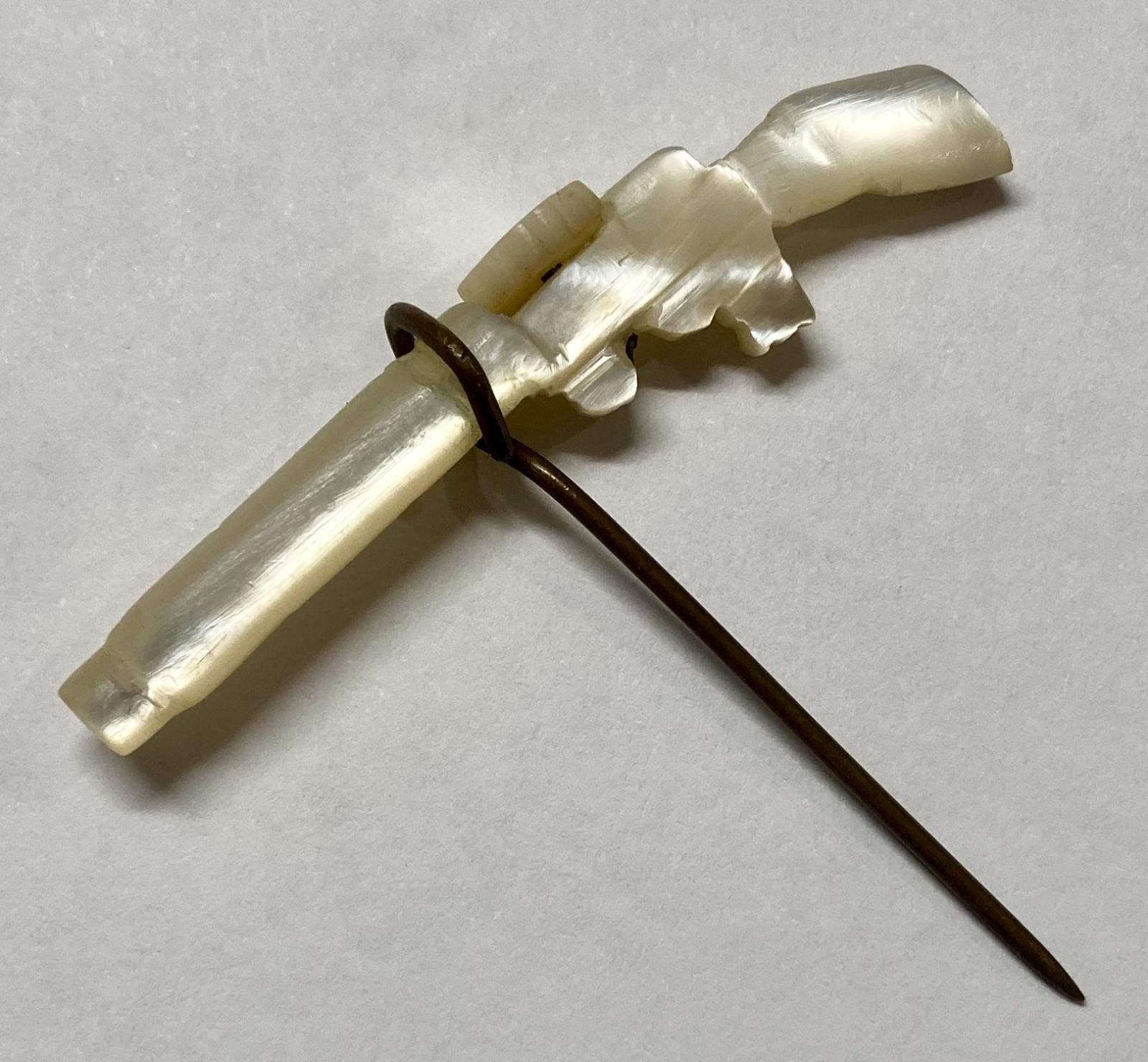 WWI era Mother of Pearl Lewis Gun pin - oblique view 