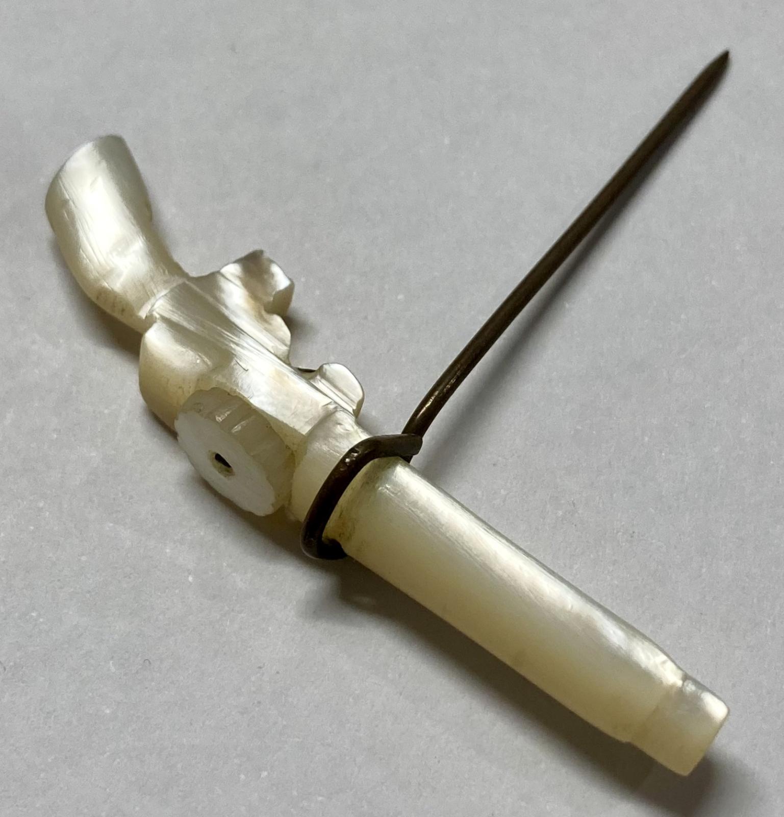 WWI era Mother of Pearl Lewis Gun pin - other oblique view 