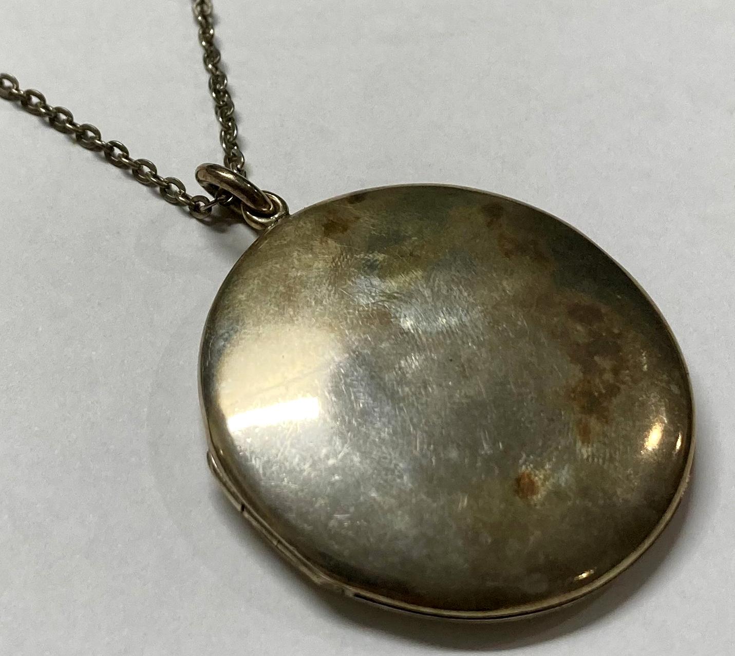 Outside of WWI silver locket - closed