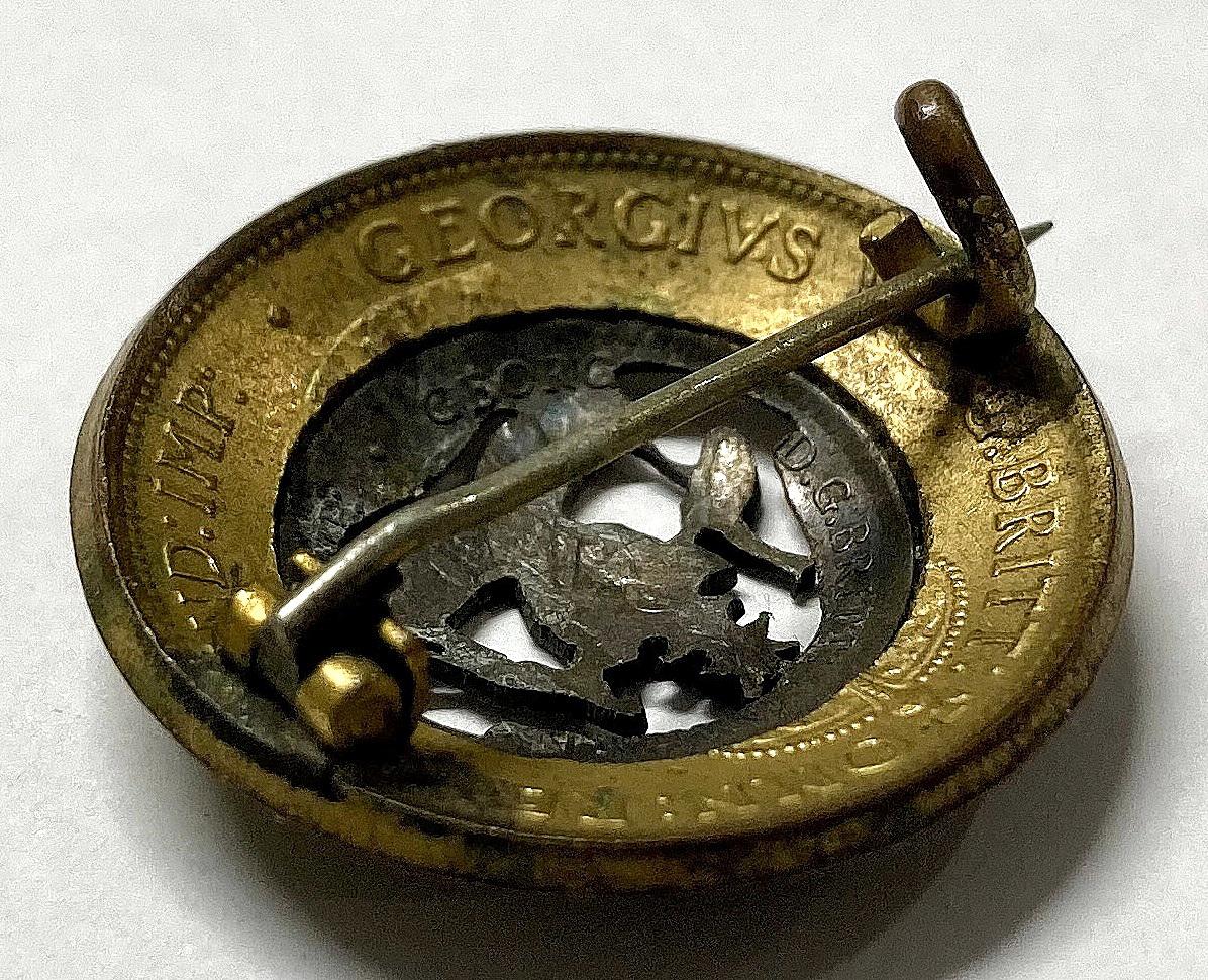 Reverse of trench art brooch made from Australian coins - 1914 - oblique view