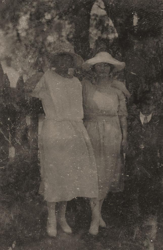 Two Women In A Garden