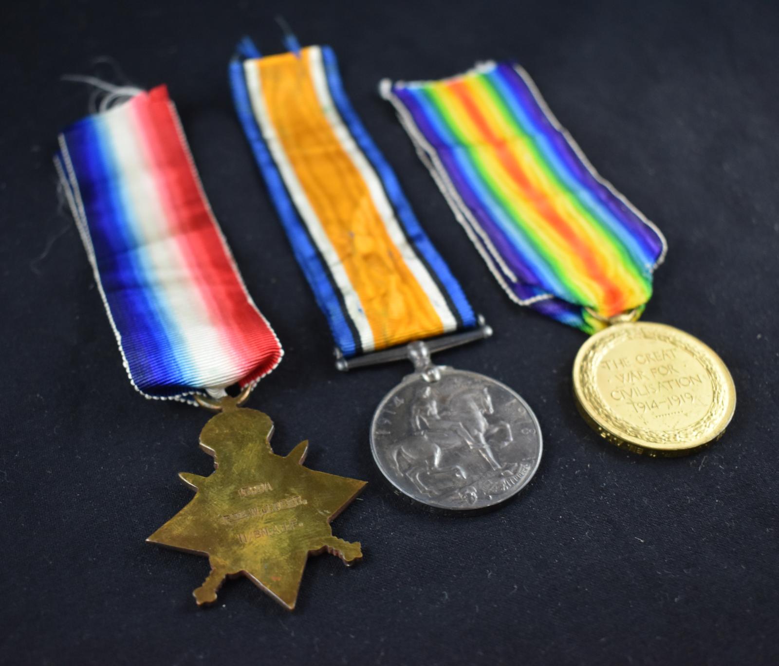 Trio of Medals Reverse