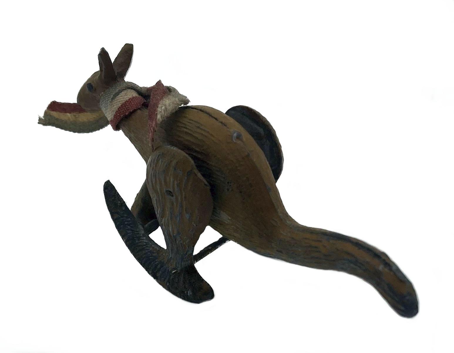 Back view of hopping metal kangaroo