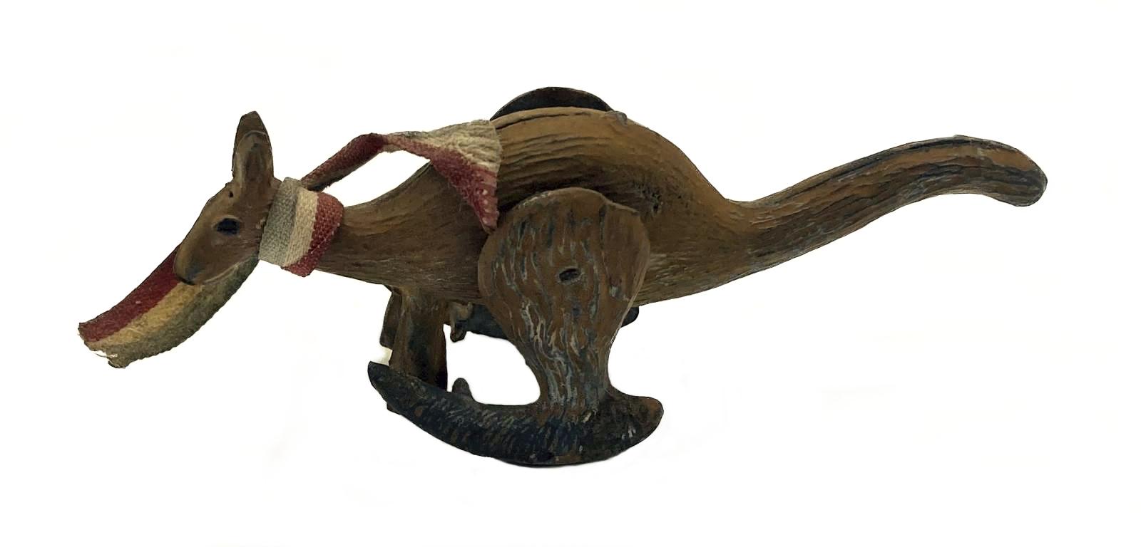 Other side view of hopping metal kangaroo