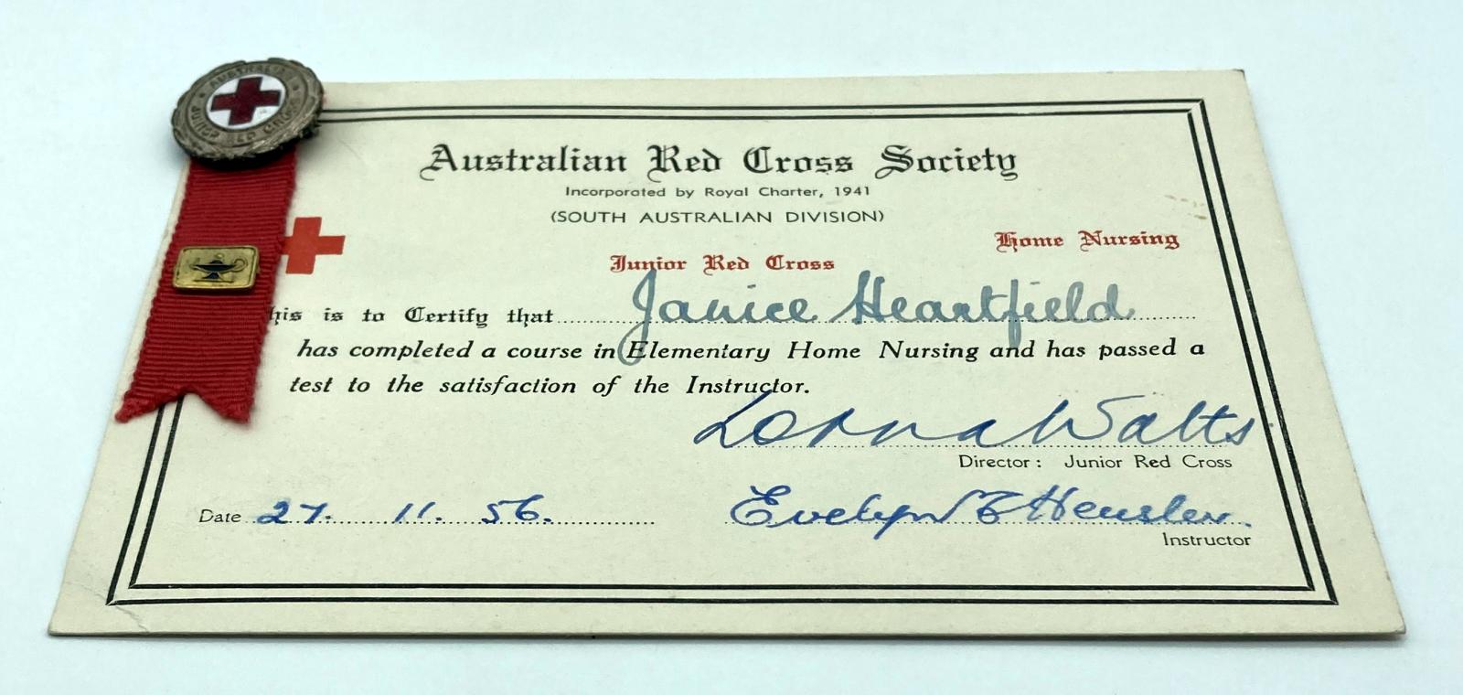 Australian Junior Red Cross certificate and badge awarded to Janice Heartfield