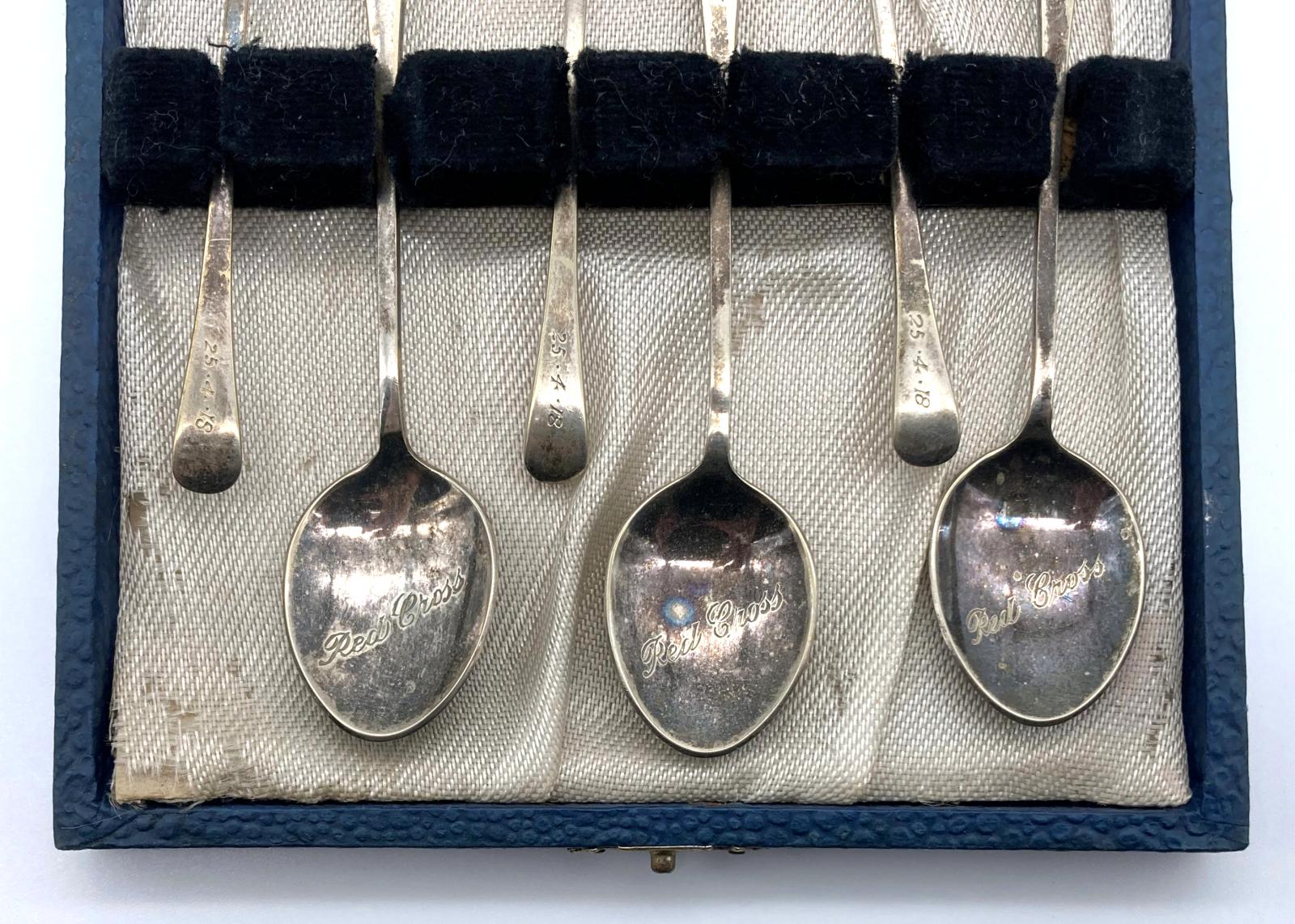 Boxed Red Cross spoons, ANZAC Day 1918 - close up of spoons