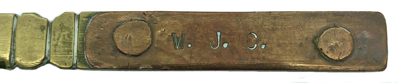 Inscription on letter opener - W.J.C.