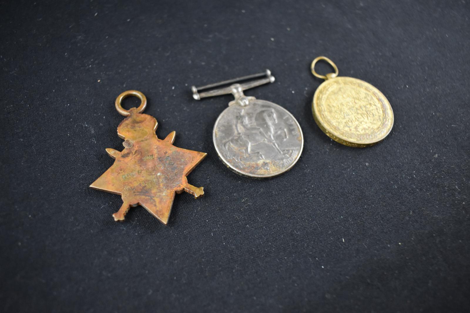 Trio of Medals Reverse