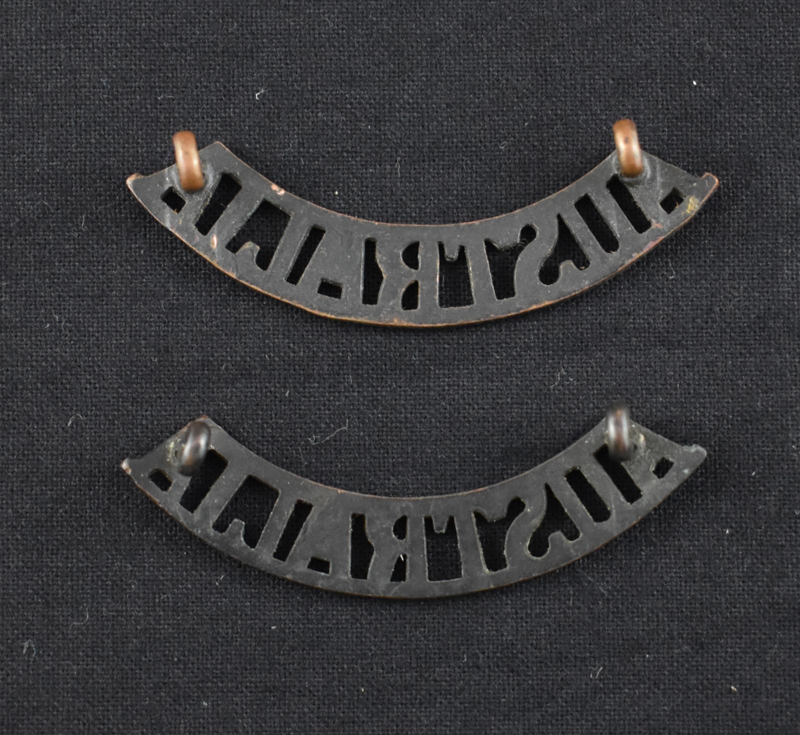 “AUSTRALIA” shoulder title badges