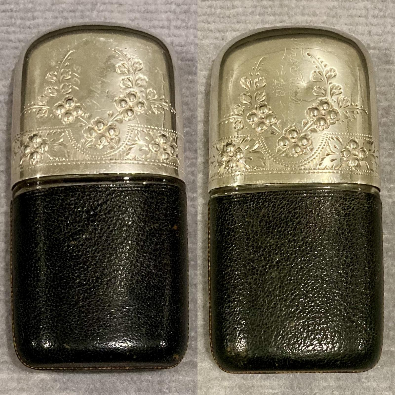 Hip flask with leather base cover and silver lid