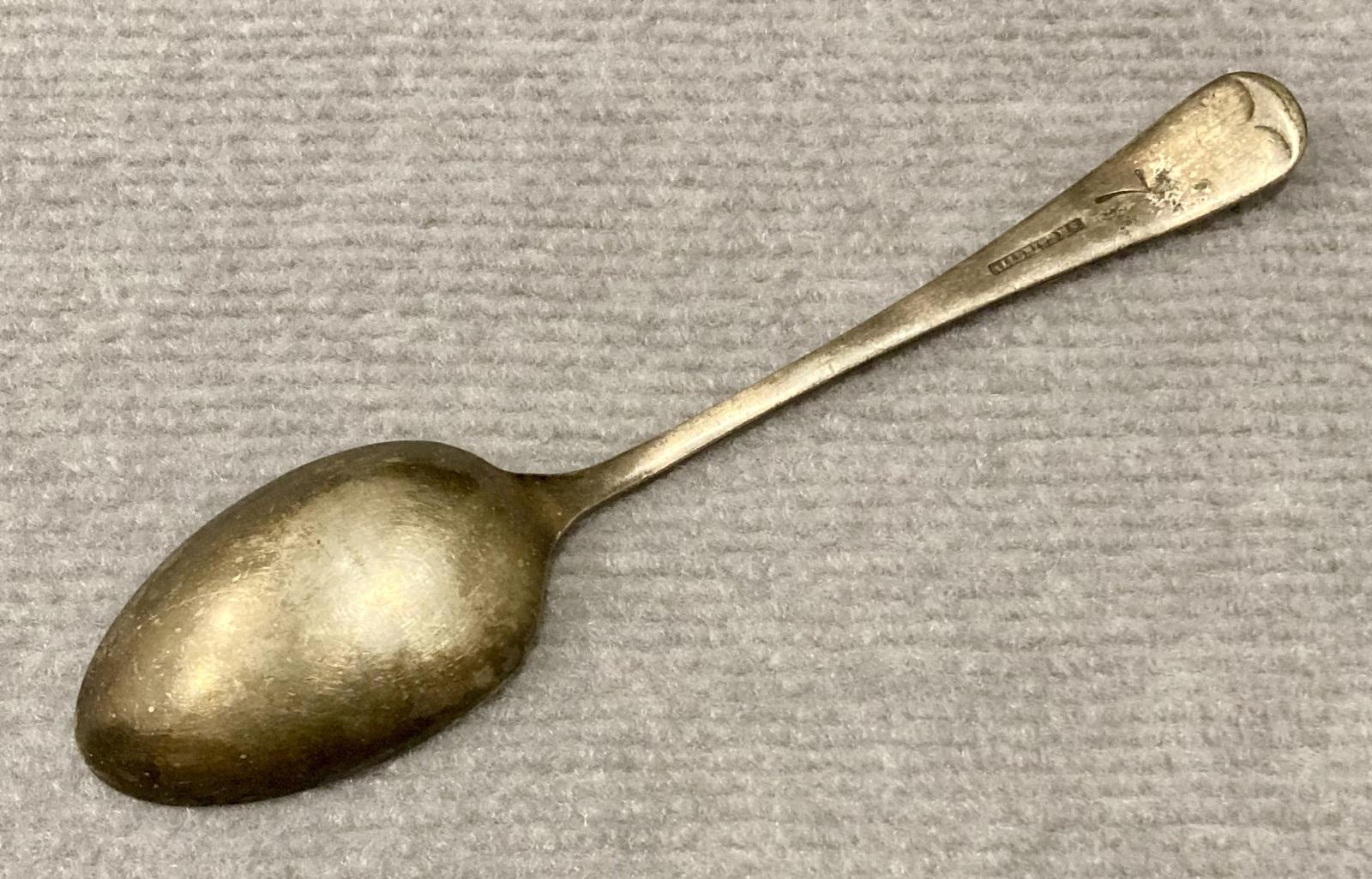 Reverse of Allbrite nickel silver spoon stamped with 'Munitions'