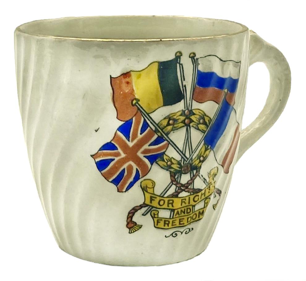 Side view of WWI era patriotic bone china cup 