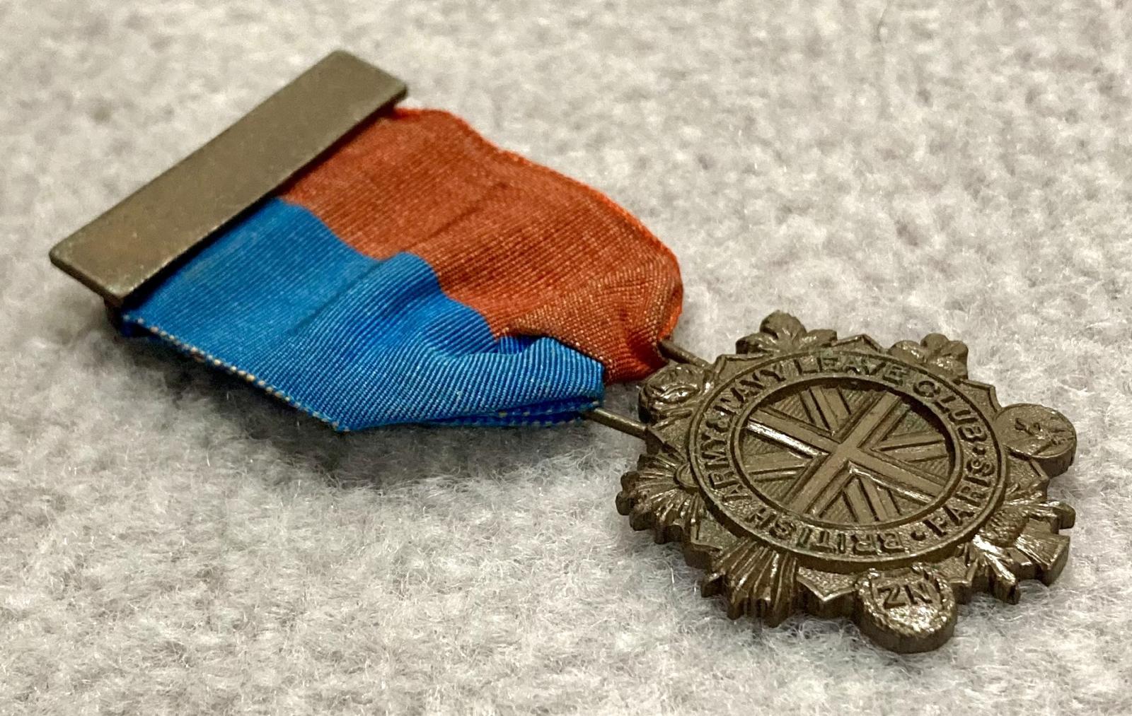 Oblique view of British Army & Navy Leave Club (Paris) medallion
