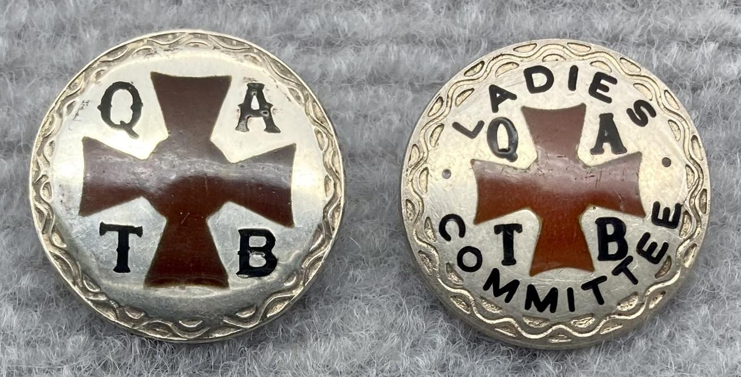 Front of Queensland Ambulance Transport Brigade (Q.A.T.B.) silver badges