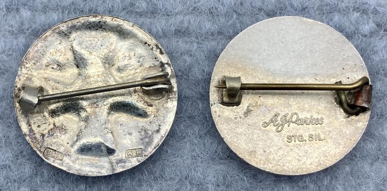 Reverse of Queensland Ambulance Transport Brigade (Q.A.T.B.) silver badges