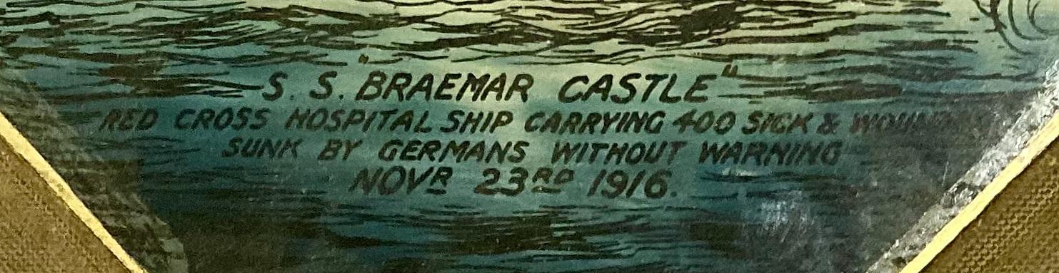 Close up of text on reverse glass painting