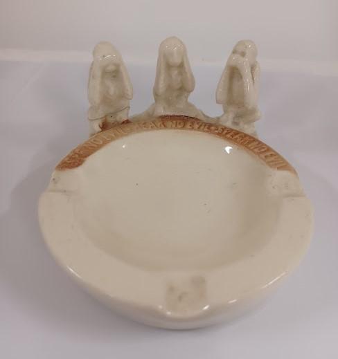 Front view of ashtray with 3 monkeys