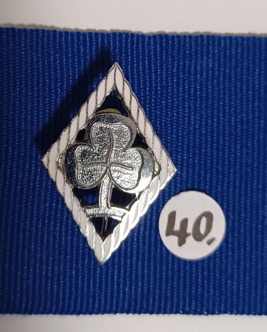 Metal badge