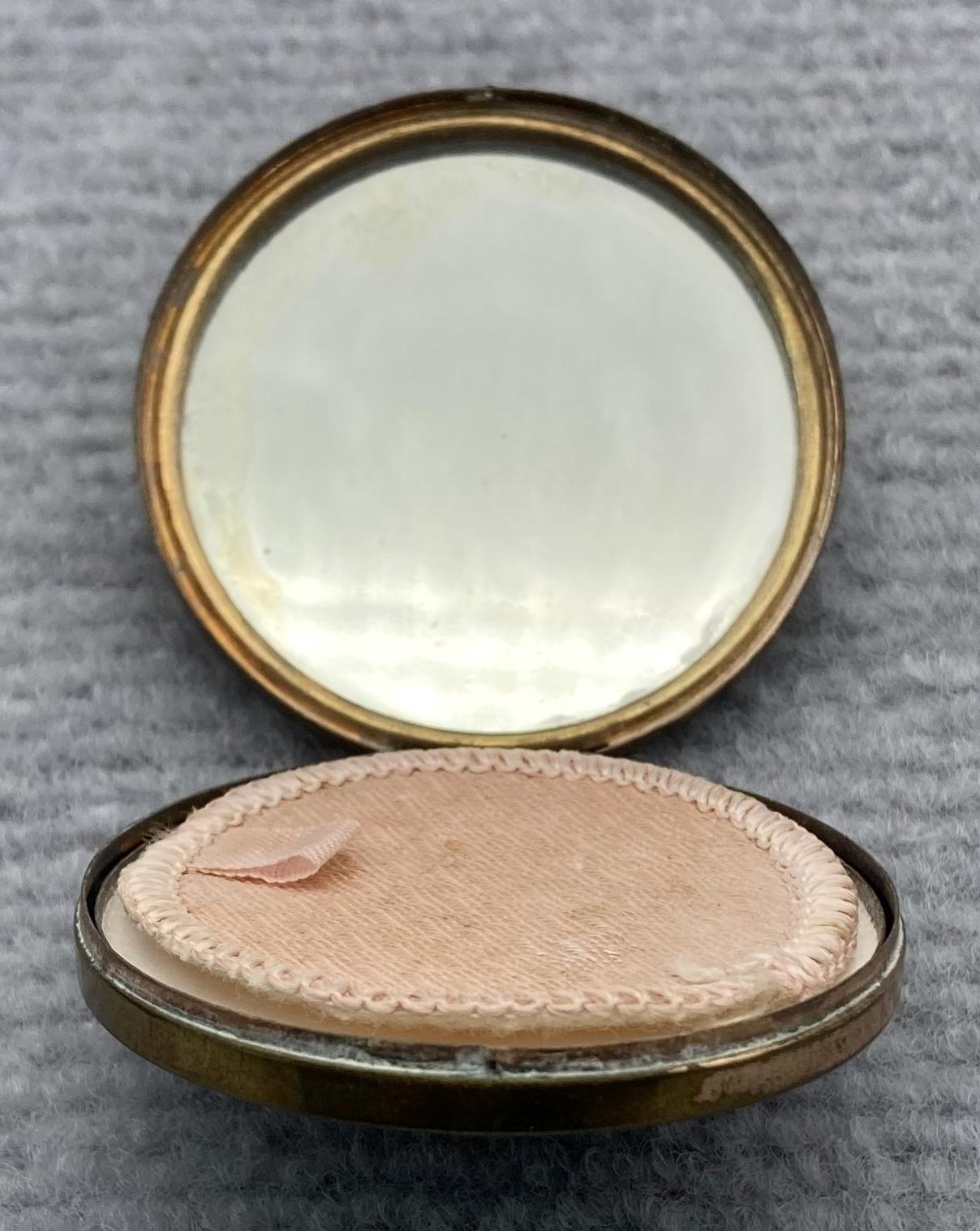 Open souvenir powder compact from Palestine