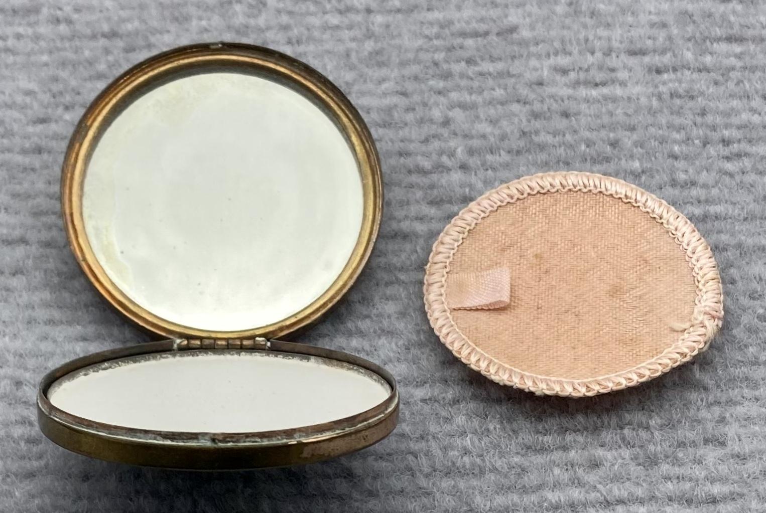 Open souvenir powder compact from Palestine