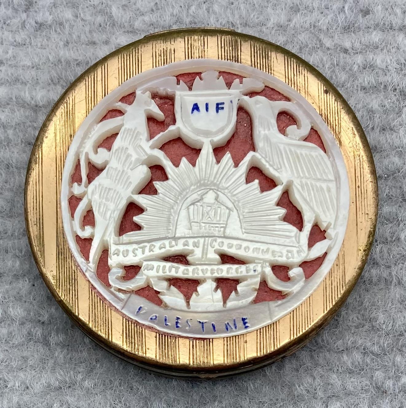 Souvenir powder compact with carved mother of pearl inlay from Palestine