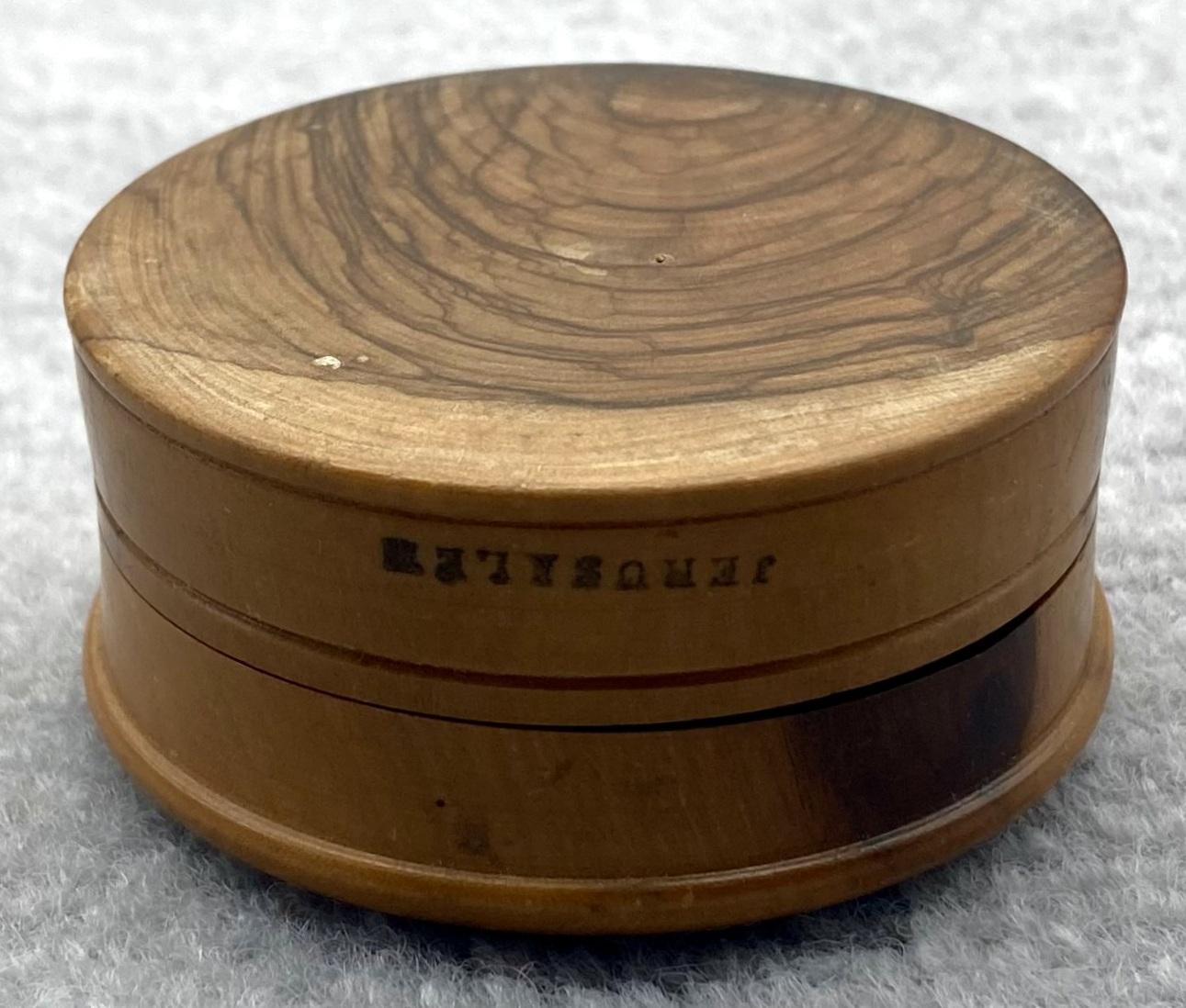 Side view of underneath of souvenir trinket box from Jerusalem with lid off