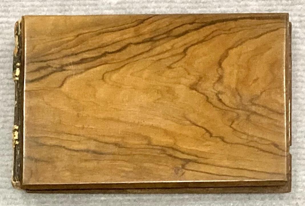 Back cover of souvenir olive wood album 