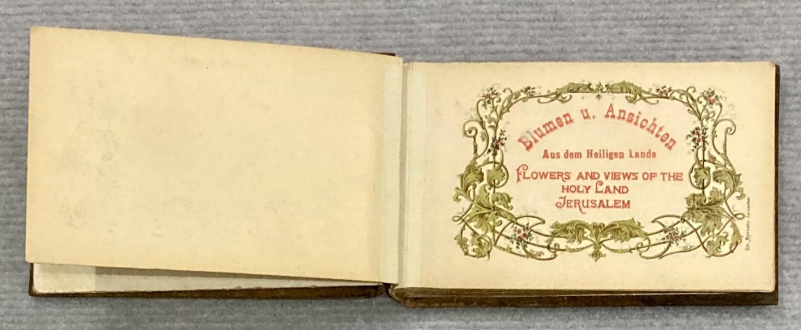 Title page of souvenir olive wood album 