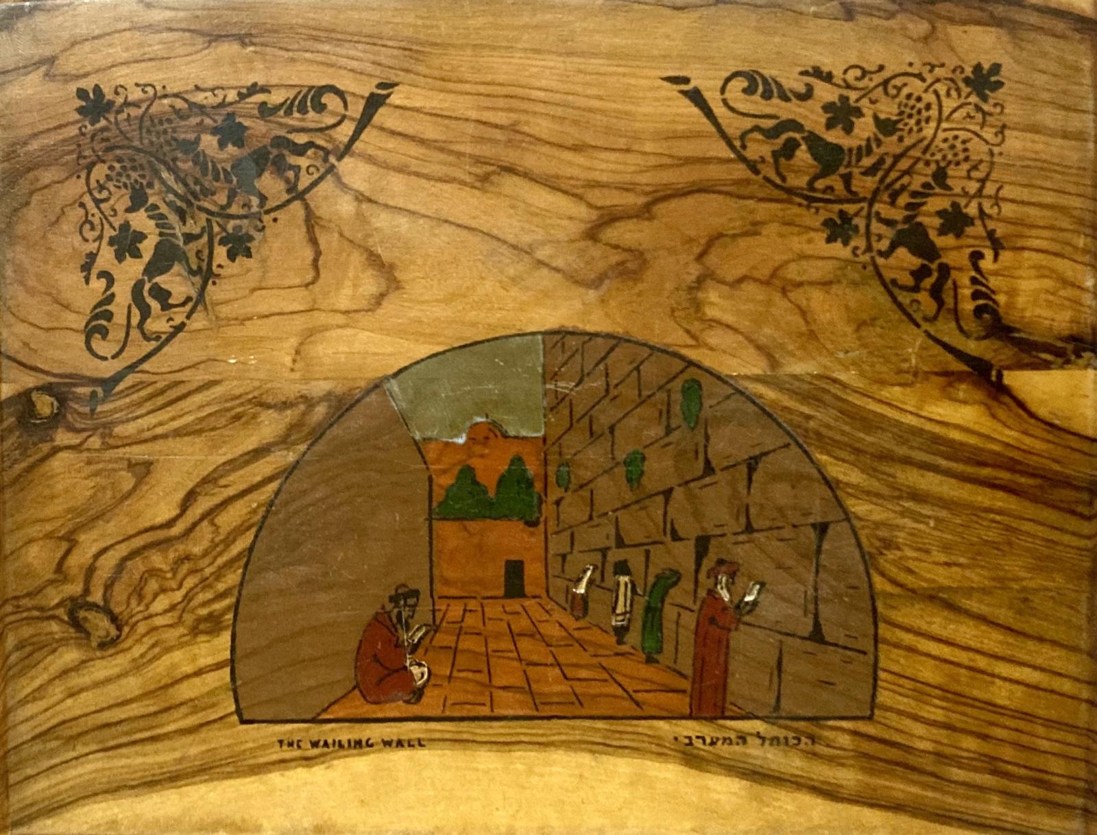 Close up of front cover of souvenir olive wood photo album sent by George Clark to Bert