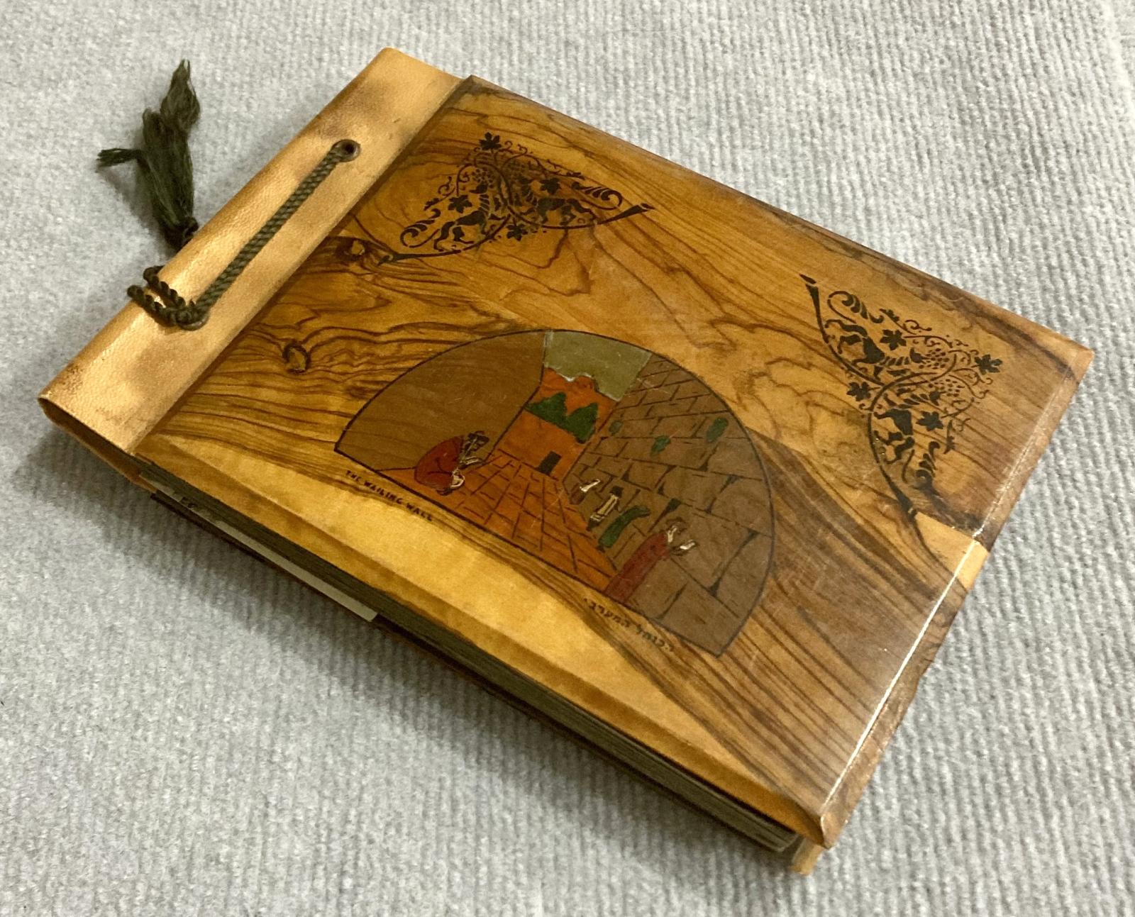 Oblique view of souvenir photo album cover