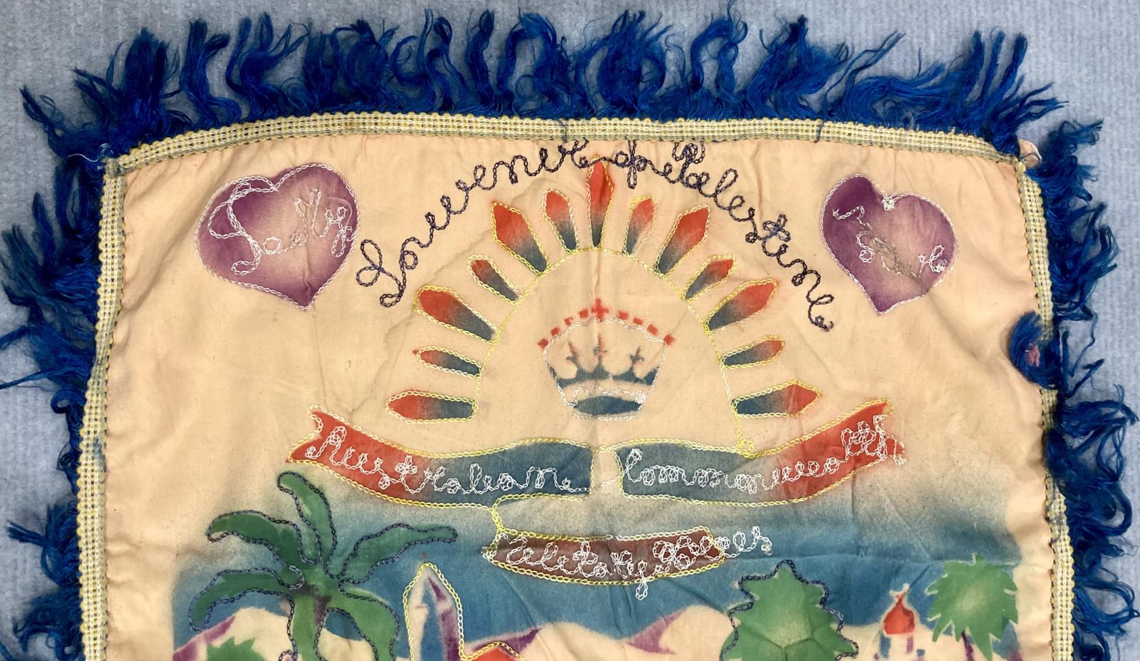 Close up of top of souvenir embroidered cushion cover from Bethlehem