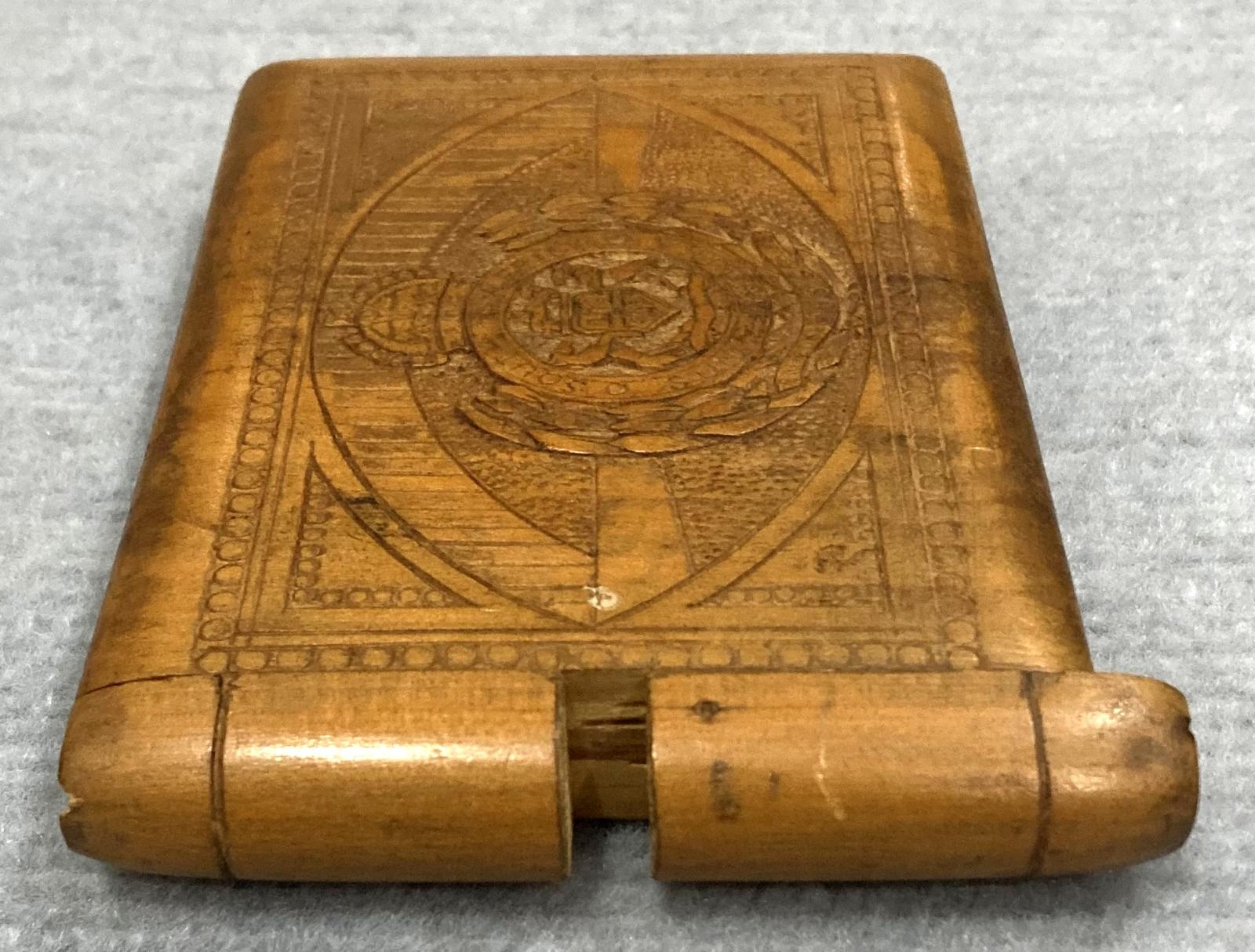 End view of front of timber case showing opening