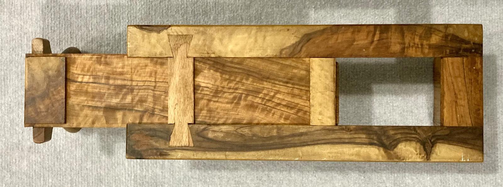 View from below of adjustable book shelf with part extension
