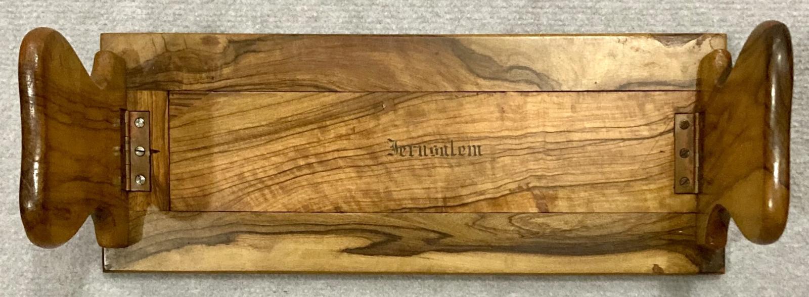 View from above of souvenir olive wood adjustable book shelf 