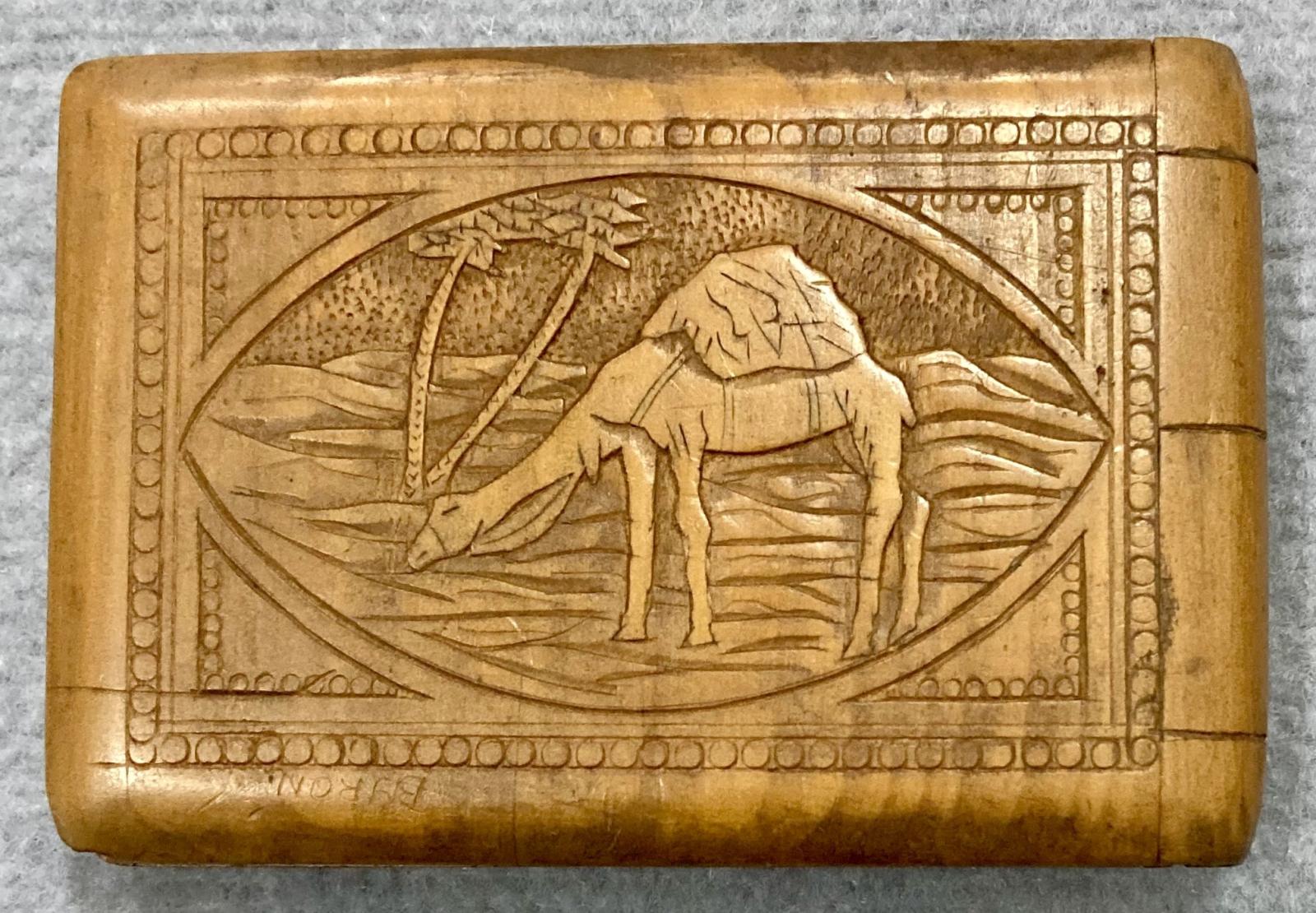 Back view of souvenir timber case featuring camel