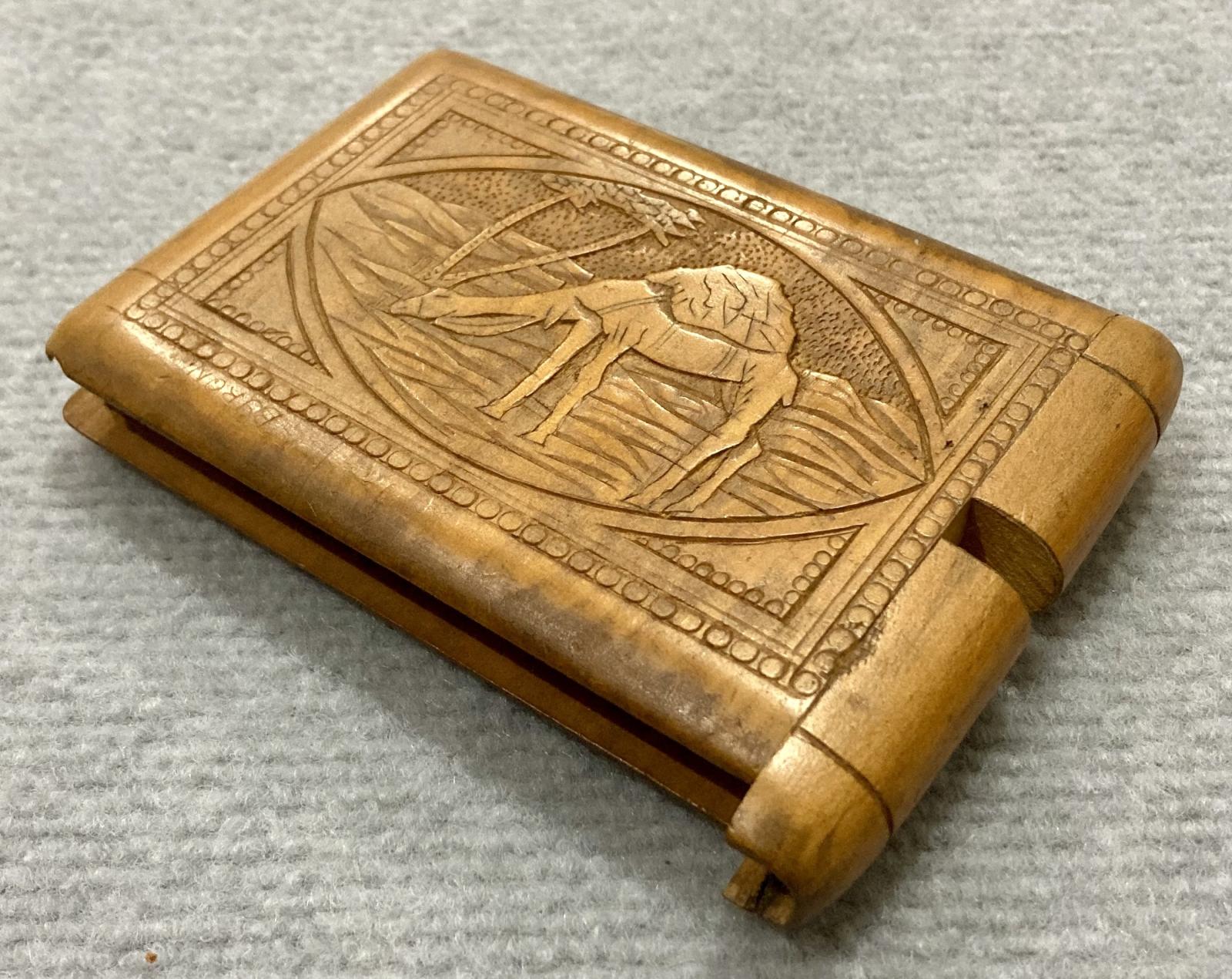 Oblique view of back of timber case showing opening