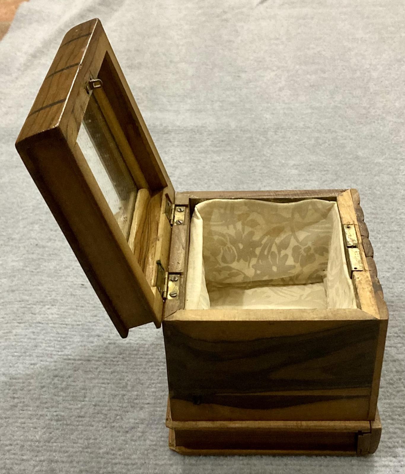 Side view of open souvenir olive wood jewellery box