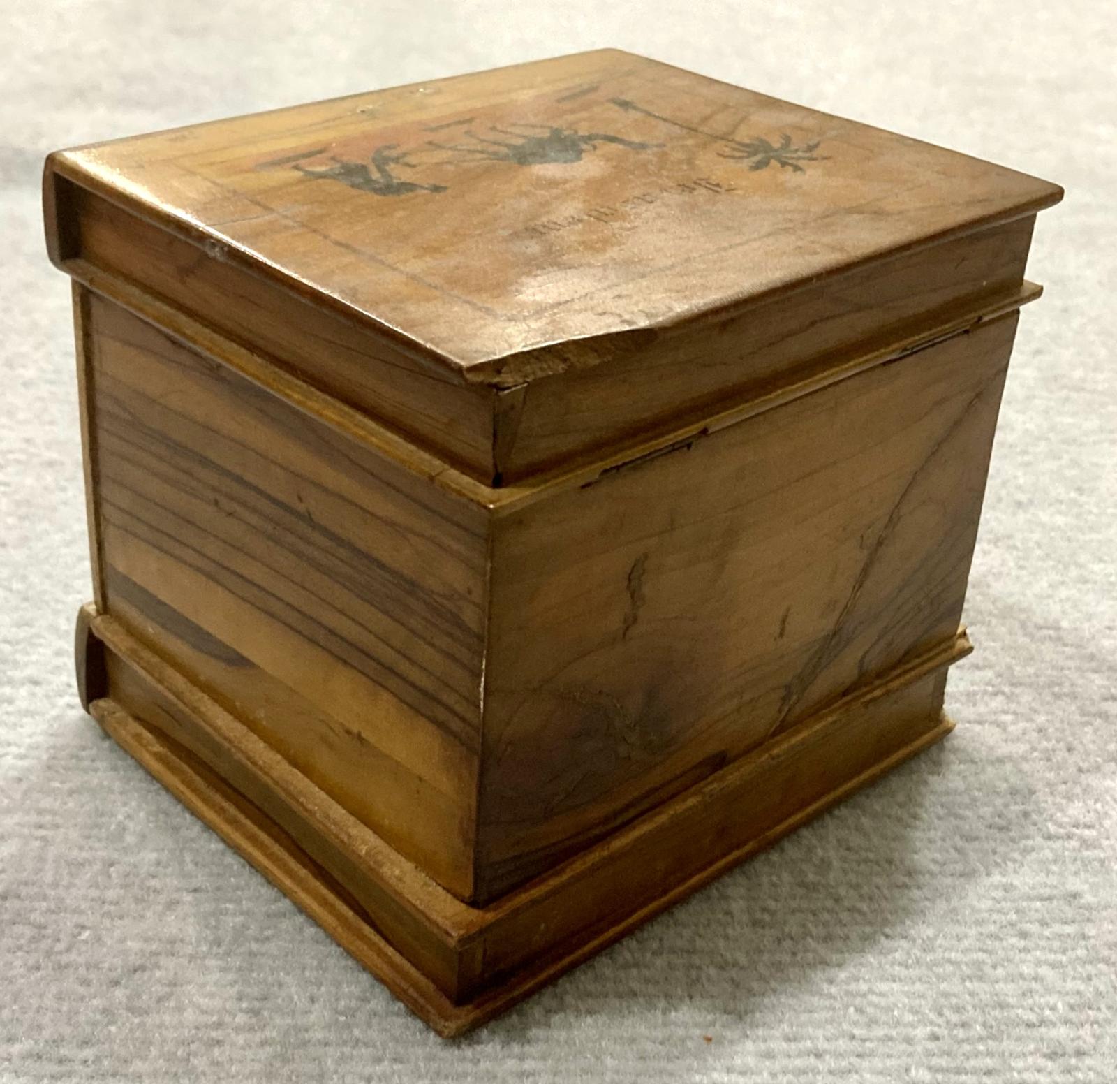 Oblique back view of souvenir olive wood jewellery box