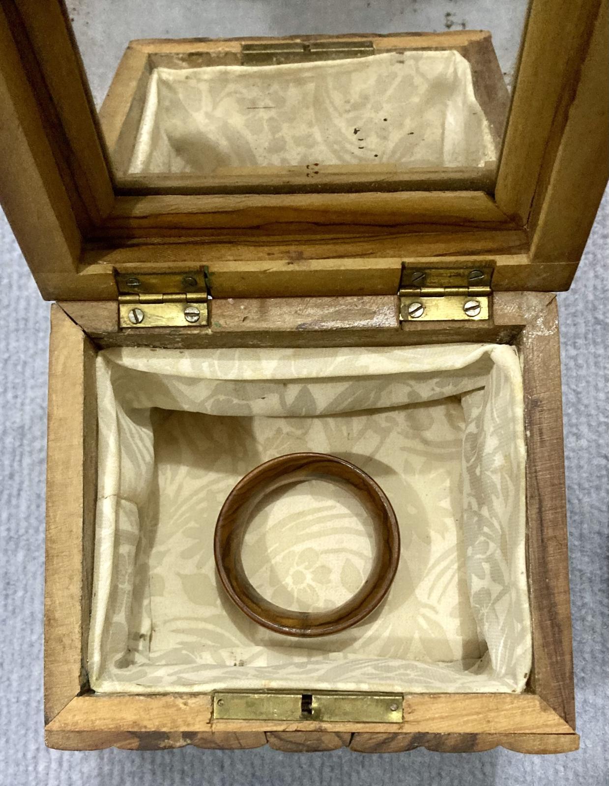 Open souvenir olive wood jewellery box sent by Evelyn to Dos in 1942 showing napkin ring within