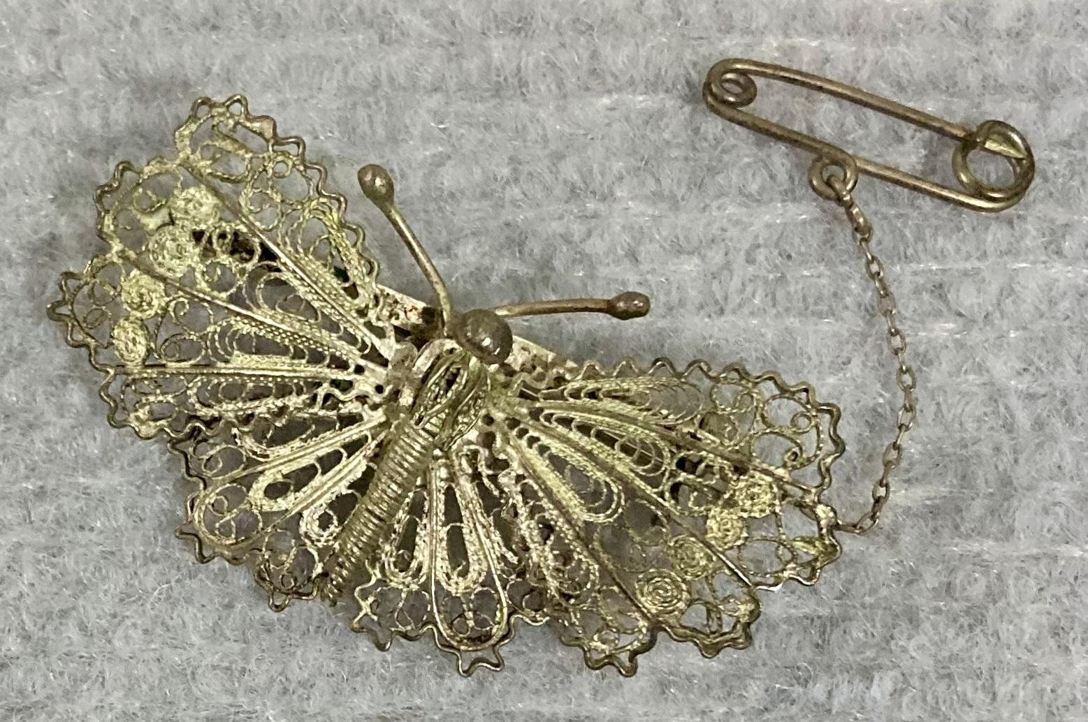 Silver filagree butterfly brooch sent from Evelyn to Dos from Palestine in 1942