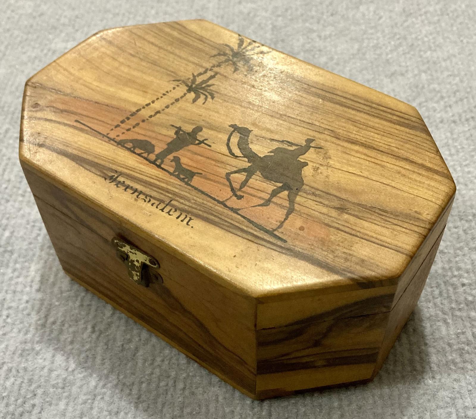 Oblique view of souvenir olive wood jewellery box from Jerusalem