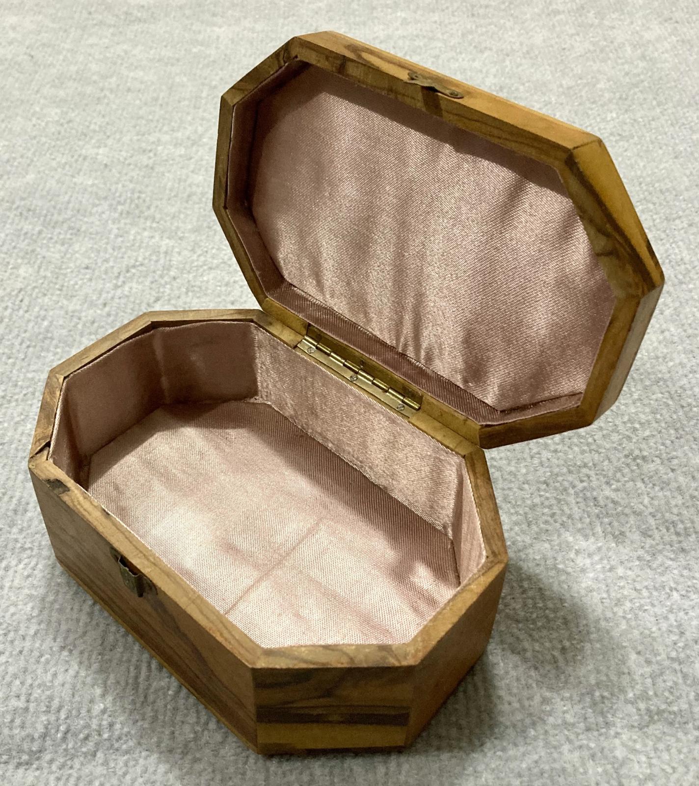Oblique view of souvenir olive wood jewellery box from Jerusalem